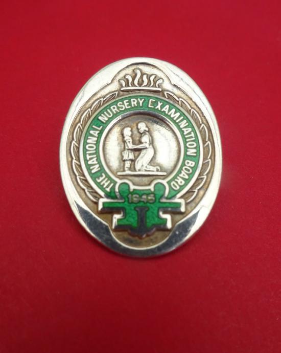 The National Nursery Nurse Examination Board,silver nursery nurse badge