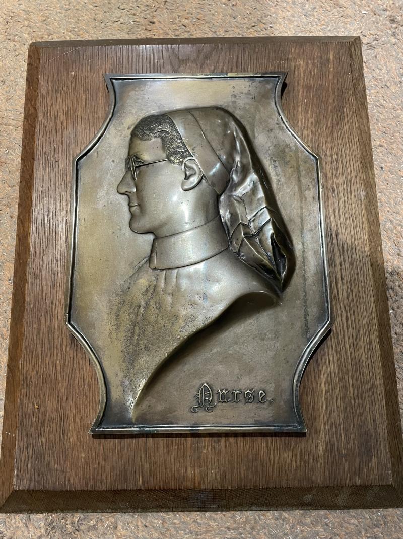 “The Nurse” bronze plaque.