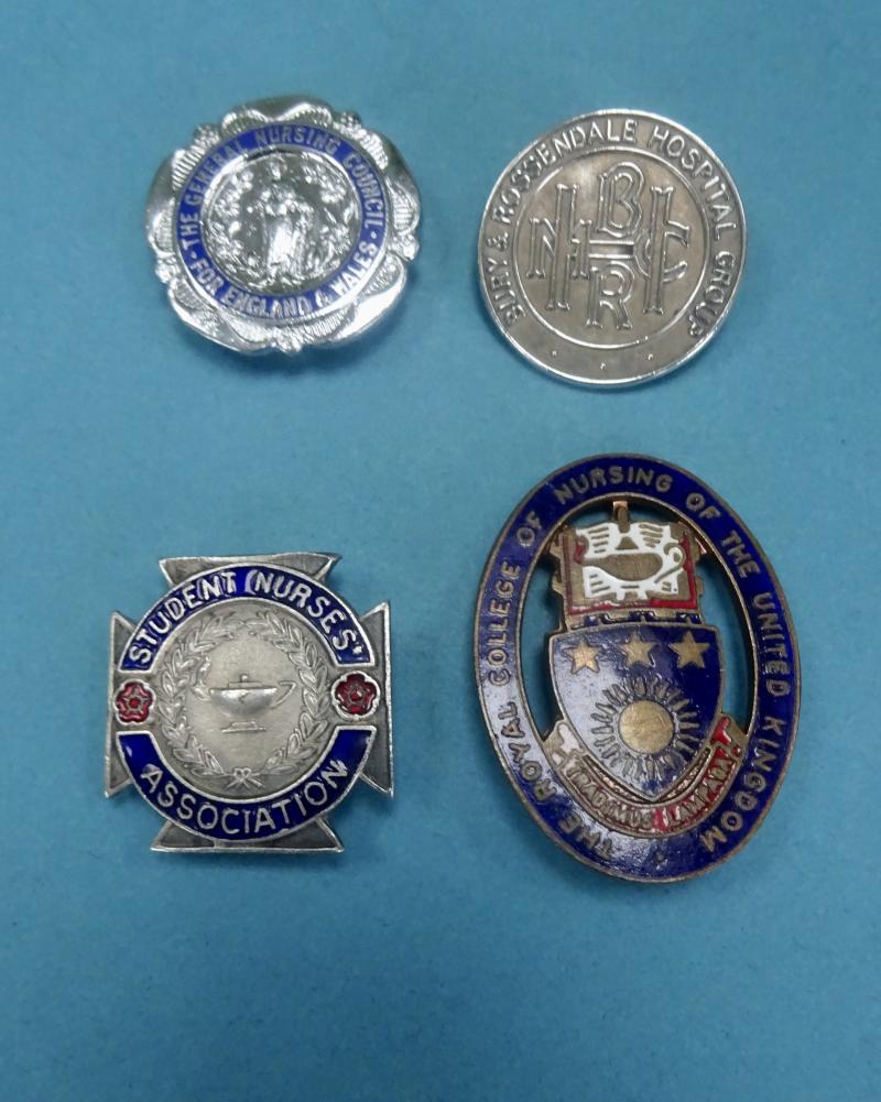 Bury & Rossendale Hospital Group, silver nurses badge and matching badges.